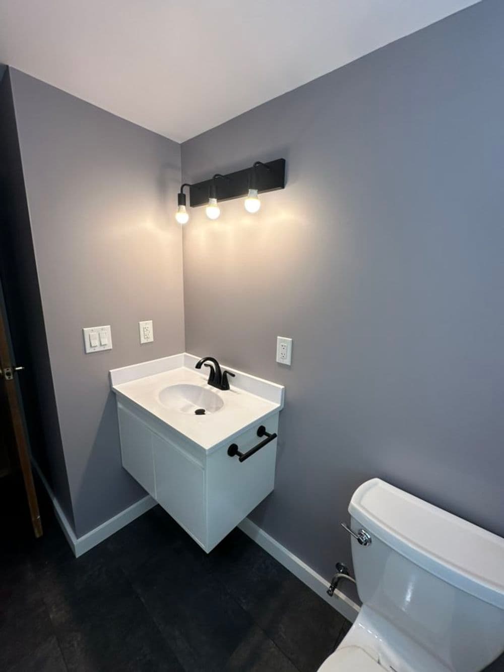Gallery photos for Bathroom Transformation Featuring Tiled Shower and Luxury Vinyl Floor in Sterling CT: Image #1