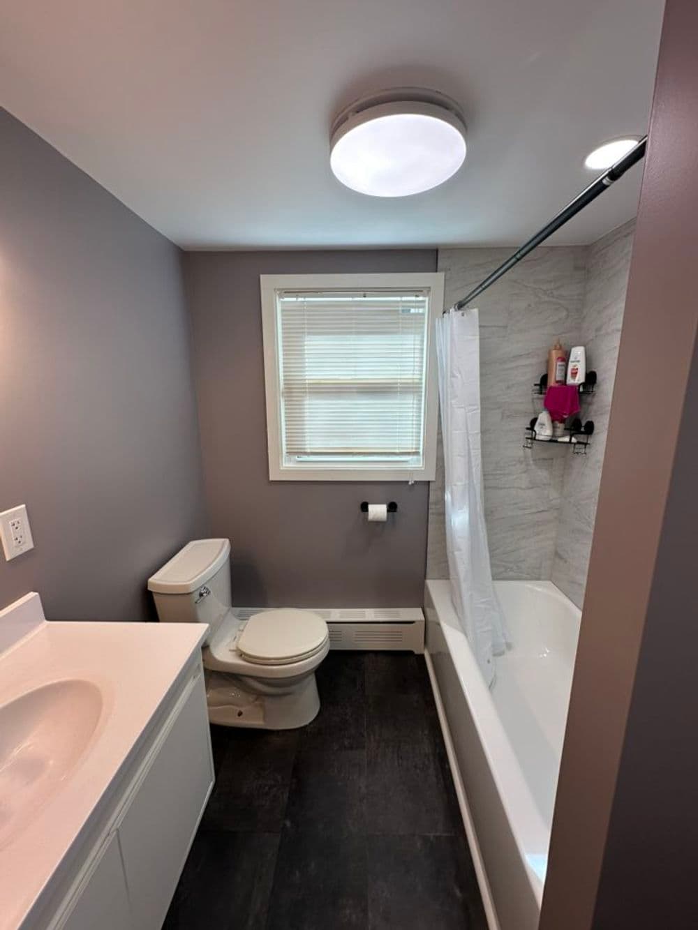 Gallery photos for Bathroom Transformation Featuring Tiled Shower and Luxury Vinyl Floor in Sterling CT: Image #2