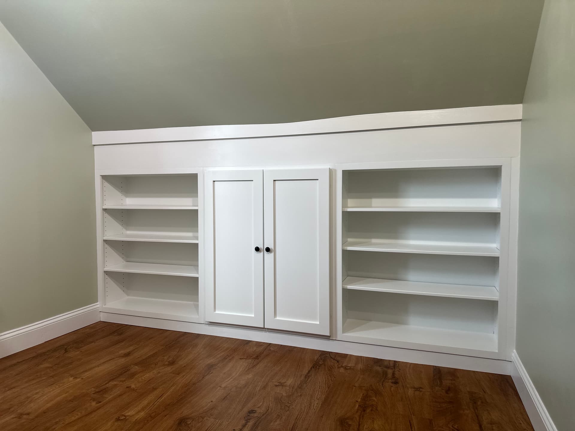 Gallery photos for Custom Built-In Cabinetry Designed for a Tricky Sloped Ceiling Space: Image #2